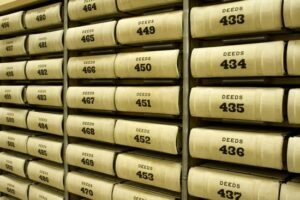 Numbered Deeds on a shelf
