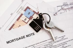Mortgage documents and house keys illustrating real estate and estate planning after death